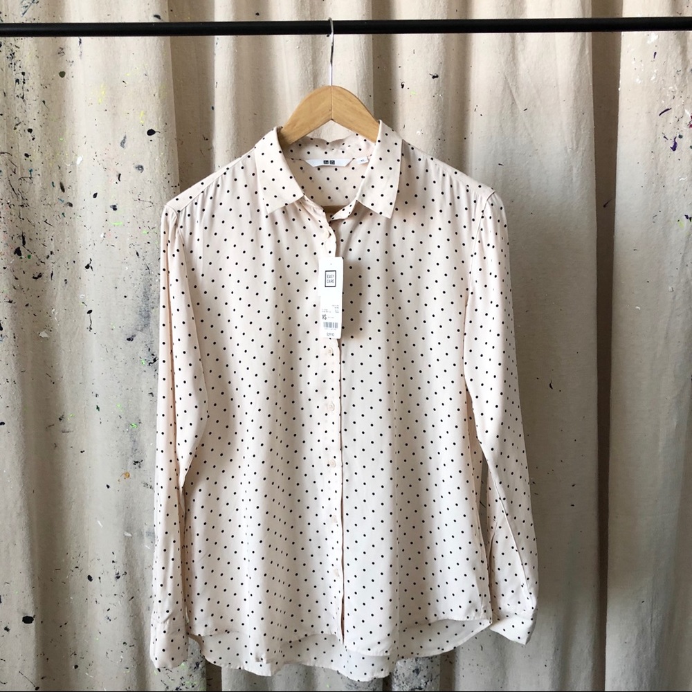 Polka dot blouse.
